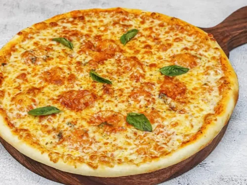 Jain Classic Margherita Pizza, no onion no garlic sourdough pizza from Wicked Good Pizza, Gurugram