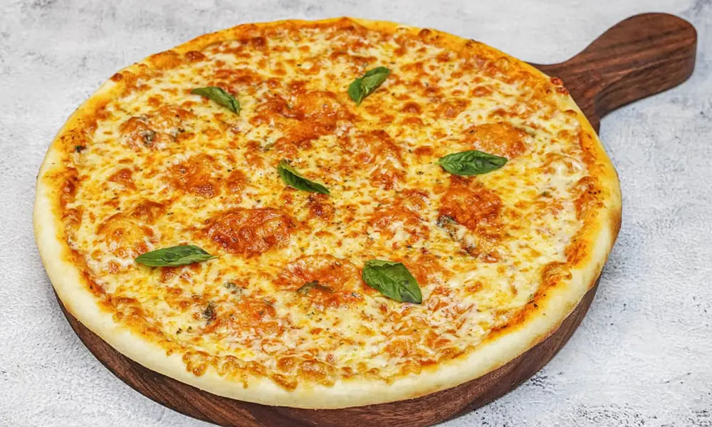 Jain Classic Margherita Pizza, no onion no garlic sourdough pizza from Wicked Good Pizza, Gurugram